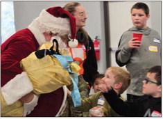 Santa spreads Christmas cheer at the Sibshop.