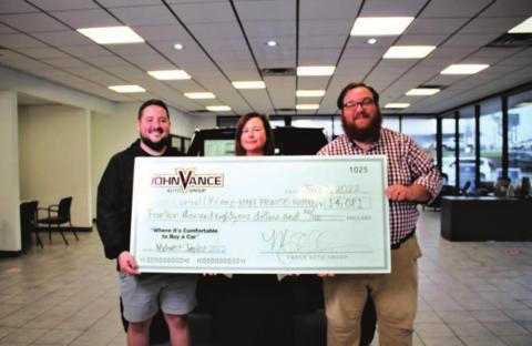 Pictured left to right are Director of Marketing and Public Relations Cody Lawson of Make Promises Happen, Vice President Megan Vance Ochs from John Vance Auto and Executive Director Jon Cunningham from Make Promises Happen.