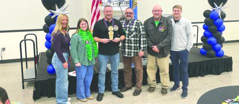 Guthrie Junior High teachers celebrate after winning the GPS trivia fundraiser with their “Smarty Gras” theme, The team claimed top honors during the fiercely competitive and fun-filled evening benefiting GPS classroom grants. Photo Nikki Bos
