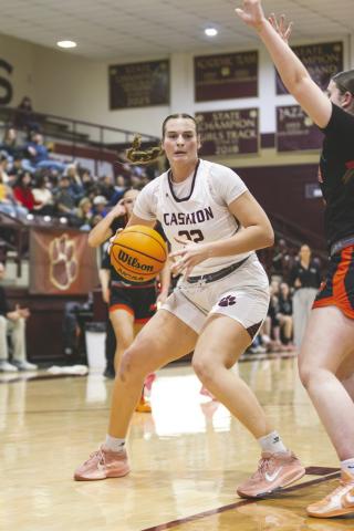 Brooke Shafer looks to pass inside against Tonkawa during Cashion’s 63 to15 victory.