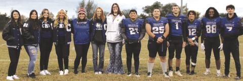 Seniors honored at Coyle Senior Night last Thursday (pictured L-R): Hailey Ruoff, Lindsay Ray, Gracie Balsiger, Ashlee Kelley, Lilly Ritter, Ryleigh Long, Gracey McBane, Joaquin Amaro, Xavier Amaro, Alex Jennings, John Tarbox IV, Jordan Williams and Wyatt Suchan. Photo by Mike Monahan