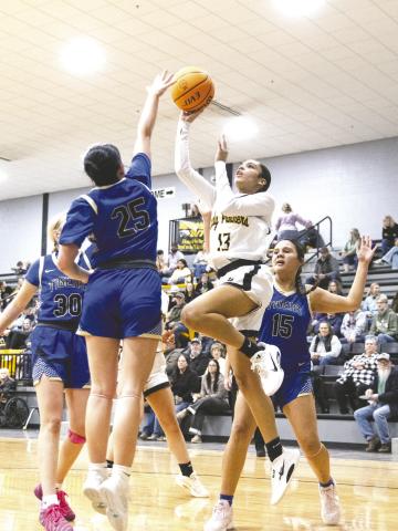 Mulhall-Orlando sophomore Raegan Graef shoots over a Shidler defender in the Lady Panthers’ 51-36 home win on Jan. 29. Graef led both teams with 20 points. Photo by Brent Fuchs