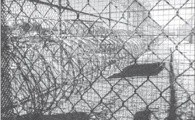 Davis Correctional Facility in Holdenville is one of two private prisons in Oklahoma. Situated just west of town, the medium security men’s prison can house up to 1,670 inmates. (Whitney Bryen/Oklahoma Watch)