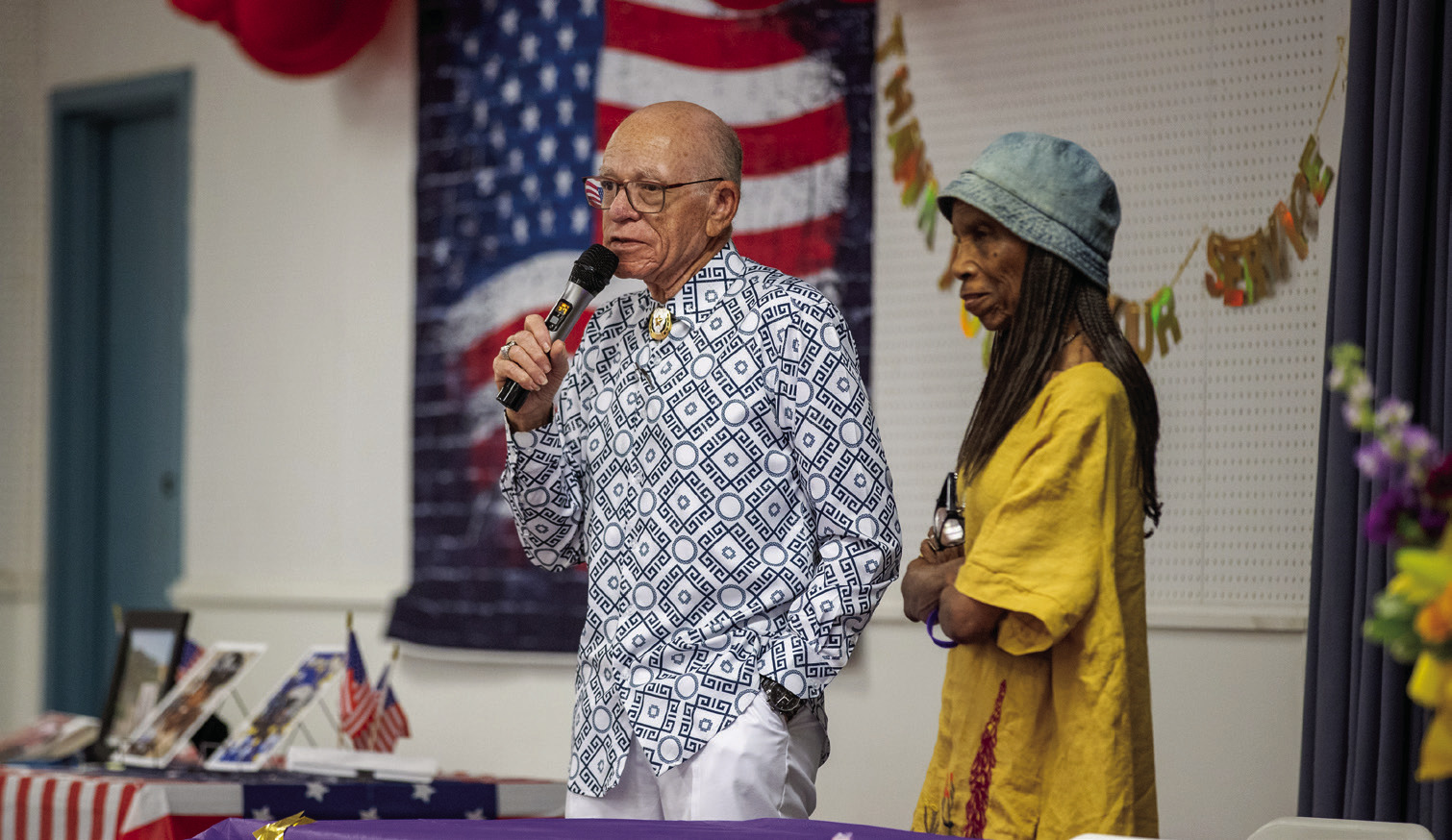 Rev. Hersey Hammons and former Guthrie Mayor Evelyn Nephew address attendees during the Faver High School Reunion held June 26-28 in Guthrie. The event brought together alumni, former faculty and community members to celebrate the legacy of Faver High School. Photo by Brent Fuchs.