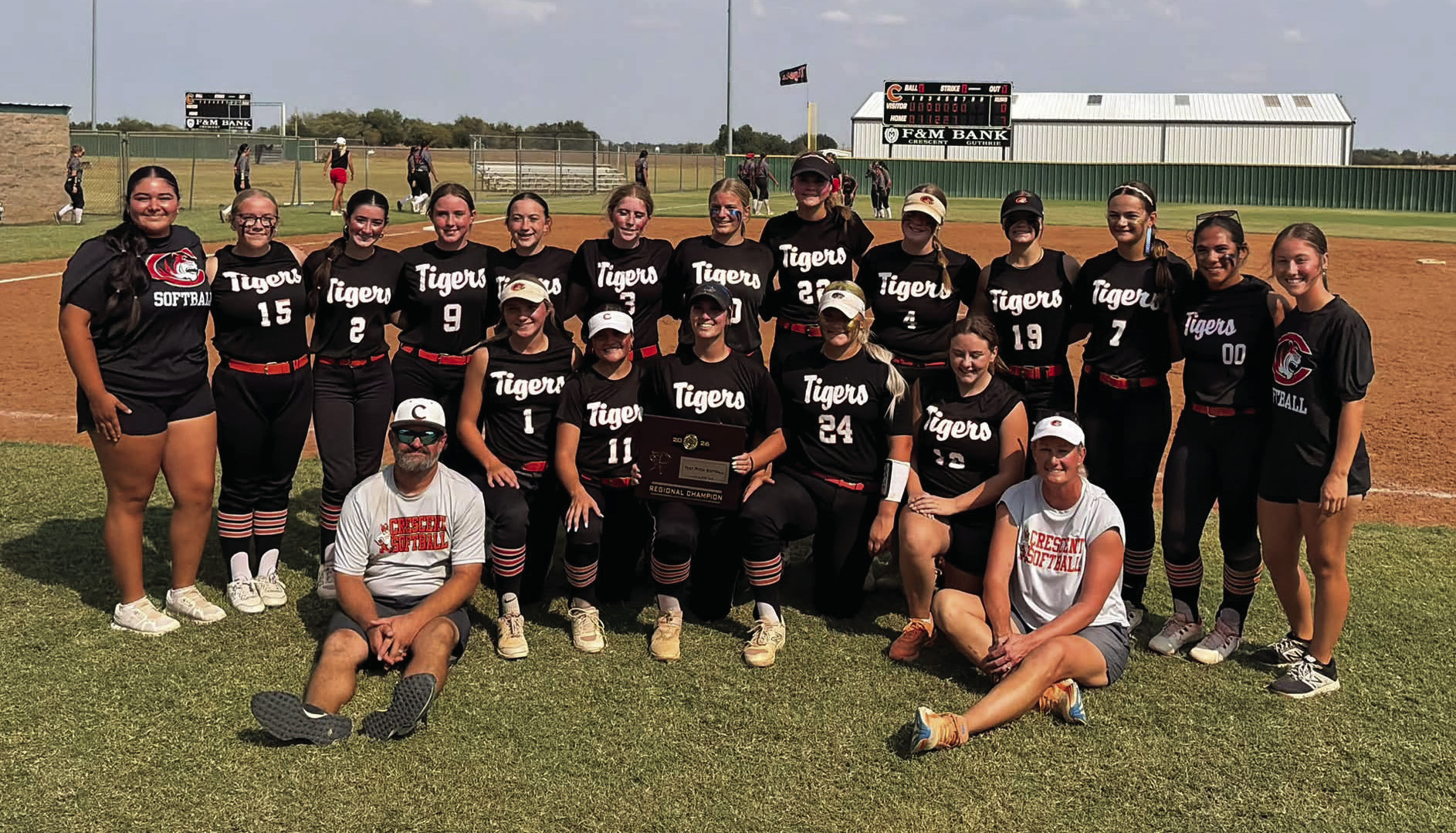 Crescent’s Lady Tigers celebrate after sweeping through regional play to claim the Class 2A regional championship. Photo courtesy of Crescent Public Schools