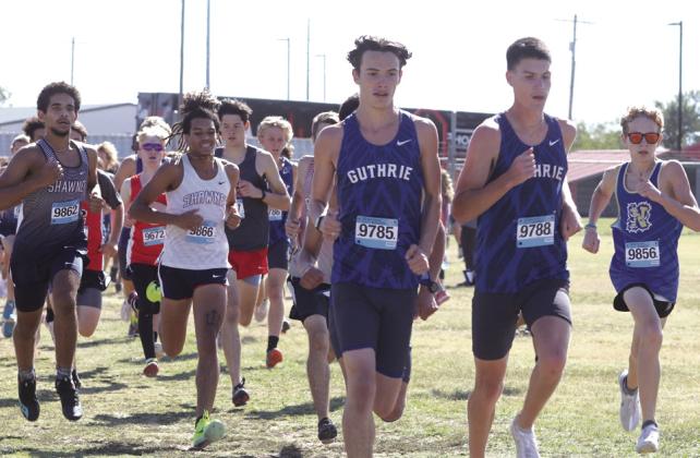 Guthrie XC Eli Fortney and Mason Mayer quickly take charge of Suburban Conference race.