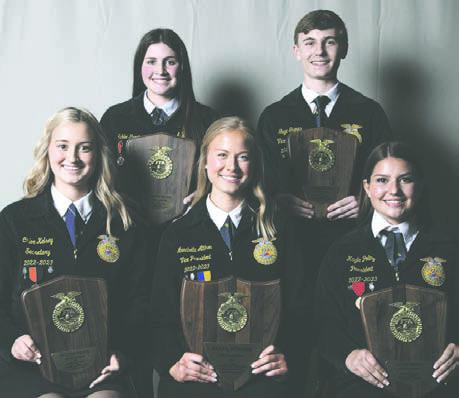 Annabella Aitken (front center) of the Guthrie FFA Chapter won first place in the agricultural policy division of the state FFA speech contest during the 2023 Oklahoma FFA Interscholastics on April 28. Chloe Kelsey (front left) of the Tecumseh FFA Chapter, Kayla Poling of the Silo FFA Chapter, Ashlee Purvine (back left) of the Thomas-Fay-Custer FFA Chapter and Gage Grimes of the Fletcher FFA Chapter placed second through fifth, respectively.