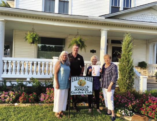 The Jonquil Garden Club has selected the home of Rob and Mary Hudson, 716 E Noble, as Yard of the Week. Pictured L to R: Mary Hudson , John Hudson, and Carolyn Kirschstein and Pam Williams, Jonquil Club representatives. Submitted photo