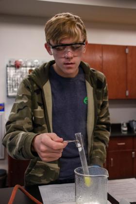 The Meridian Technology Center STEM Academy was named a Distinguished High School by Project Lead the Way (PLTW) for its Biomedical Sciences and Pre-Engineering programs. Pre-Engineering student Gideon Heil conducts an experiment in the lab.