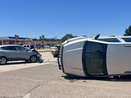 Collision causes injuries and lands a Durango on its side.