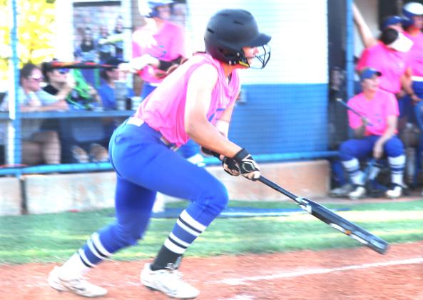 Gallo gets one of her multiple hits in game against Enid.