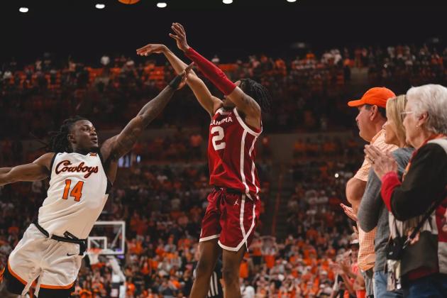 OU's Javian McCollum shoots the game-winning three to defeat Oklahoma State, 84-82, on Feb. 24. Courtesy of OU Athletics.