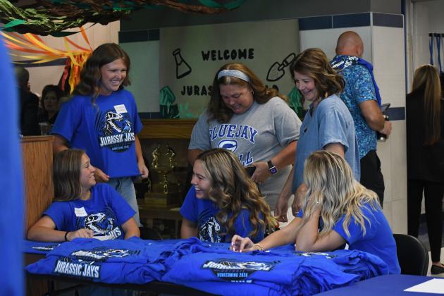 Blue Out, Jurassic Jays Spirit Homecoming spirit came to life as Student Council members Emalyn Redman, Lola Brown, Savannah Ingle and Addison Long joined parents Amy Ingle and Amelia McCormick around a table of Homecoming shirts. With Blue Out as the game theme and Jurassic Jays as the Homecoming theme, the group helped bring school spirit and tradition together. From preparing shirts to supporting school activities, Student Council and their families played a part in making Homecoming memorable.