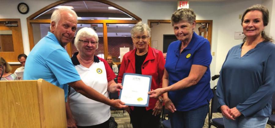 Pictured above, Guthrie Mayor Steve Gentling presents Poppy Day Proclamation to American Legion Auxiliary members Jane Price, Tillie Hartman, Kitty Kisner, and Vickie Nunez. Poppy Day is May 28. Photo by Mike Monahan