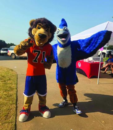 Mascot Mash-Up: Jay the Lion joins the Guthrie Bluejay during the Guthrie Chamber of Commerce’s Back to School Bash. Photo courtesy of Guthrie Public Schools.