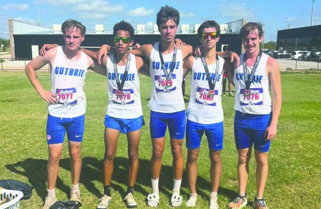 The Guthrie High School boys cross-country team captured the team championship at the Suburban High School Conference meet with 15 points, led by individual champion Wyatt Watson, who finished the 5,000-meter race in 17:26.5. Photo courtesy of Guthrie Public Schools.