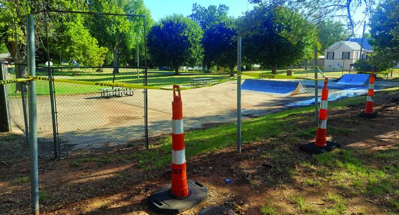 The crash scene at Ritzhaupt Park is shown Monday morning after a vehicle that caught fire was removed. Photo by Jennifer Tennyson