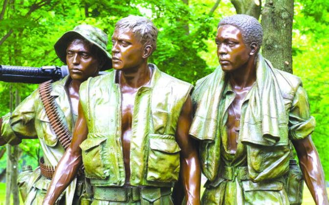 Vietnam Veterans Memorial, in Washington DC, 'The Three Soldiers' statue by Frederick Hart — Photo by arak_/depositphotos.com