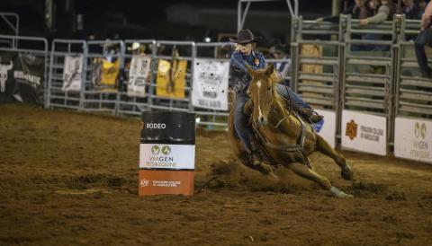 Kenna McNeill competes in the barrel racing event at the Cowboy Stampede Rodeo in Payne County in April. (Photo by Todd Johnson, OSU Agricultural Communications Services)