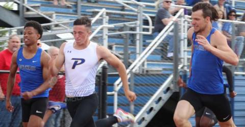Photos by Mike Monahan Jaylen Chelf’s Piedmont’s William Geiger and Mason Tilley in 100 meter race