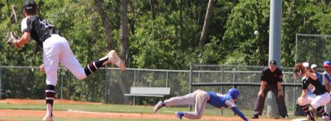 Cashion pitcher Hayden Branch throws to Joey Wilson on a pick-off play