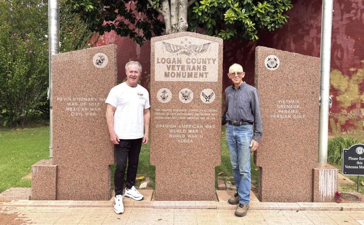 Project Coordinators (L to R) Major Pete Reed and Ron Powell in front of the Logan County Veterans Monument. Submitted photo.