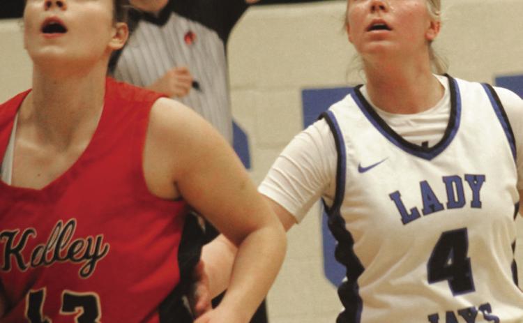 Guthrie's Kinley Duehning eyes a rebound against Bishop Kelley, Dec. 20, 2024. Photo by George McCormick.