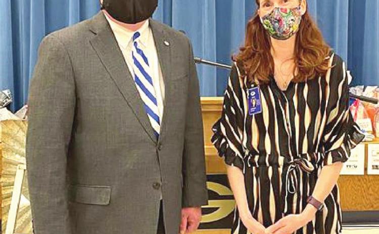 Superintendent Dr. Mike Simpson (left) and Cotteral Elementary Librarian Kat Jensen (right) after Jenson was named Teacher of the Year.