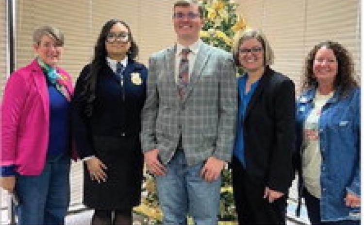Pictured with Michelle and Ridge is FFA Advisor, Dusty Oldenburg, FFA Advisor, Savannah Rennick and Rotarian, Kristal Flury.