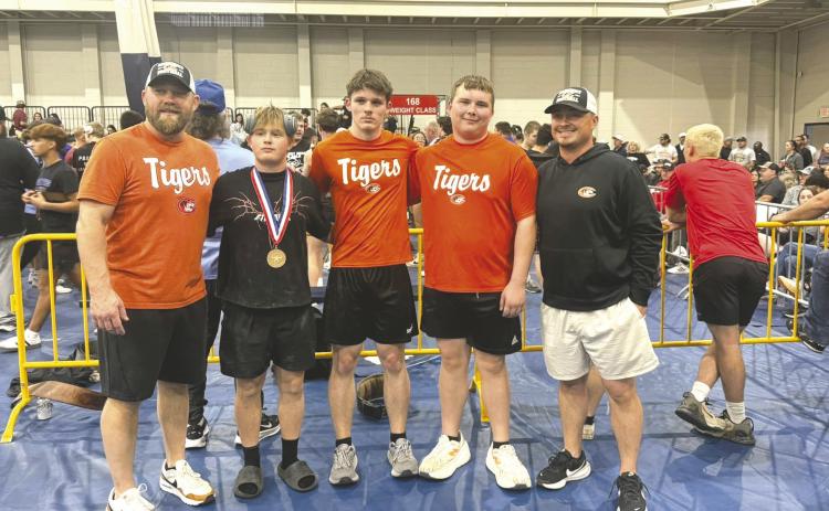 Pictured left to right are Coach Dalke, Houston Wilmoth, Evan Stanfill, Beaux Deason, and Coach Hixon. Photo courtesy of Crescent football facebook page.