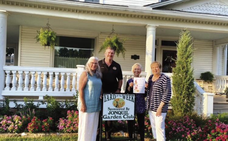 The Jonquil Garden Club has selected the home of Rob and Mary Hudson, 716 E Noble, as Yard of the Week. Pictured L to R: Mary Hudson , John Hudson, and Carolyn Kirschstein and Pam Williams, Jonquil Club representatives. Submitted photo