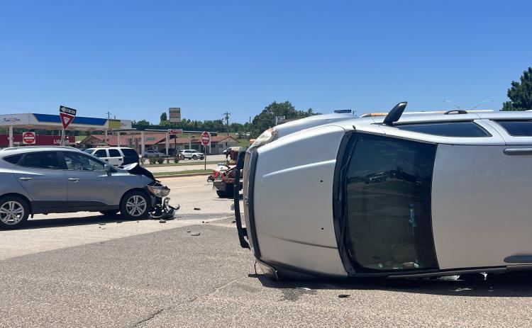 Collision causes injuries and lands a Durango on its side.
