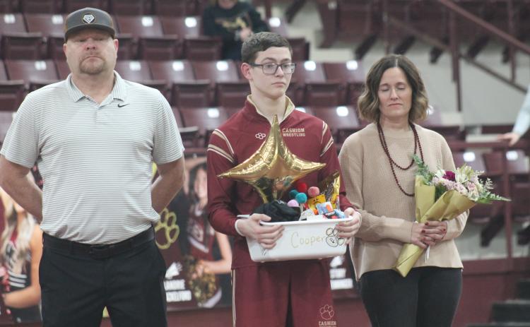 Cashion wrestling senior Cooper McGuire with his family on senior night. Taken by George McCormick