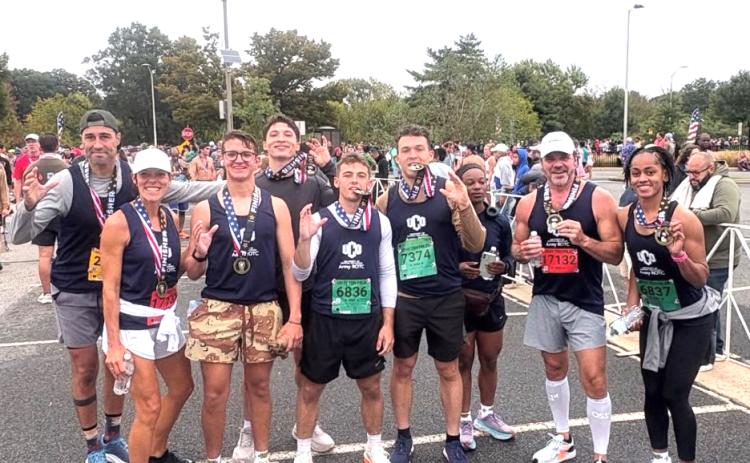 (L to R) Lieutenant Colonel Shaun McIntosh, Rachelle Franz, Brycen Sampson, Pierre Esquibel, Boston Wybrant, Luke Johnson, Mary Rocco, President Todd Lamb, and Tay’Maro Powell.  Submitted photos