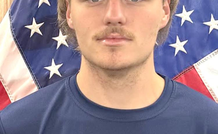 Guthrie High School senior and JROTC member Garrett Looney recently enlisted in the U.S. Army as a Combat Medic Specialist. Photos courtesy of Guthrie JROTC