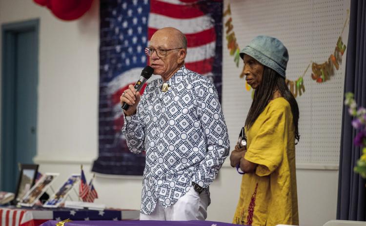 Rev. Hersey Hammons and former Guthrie Mayor Evelyn Nephew address attendees during the Faver High School Reunion held June 26-28 in Guthrie. The event brought together alumni, former faculty and community members to celebrate the legacy of Faver High School. Photo by Brent Fuchs.