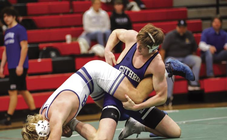 Guthrie's Clayton Carey competes against Sapulpa at the 2025 5A-5 District Duals on Tuesday, Jan. 21. Photo courtesy of Nicole Hall, Guthrie Wrestling (Facebook).