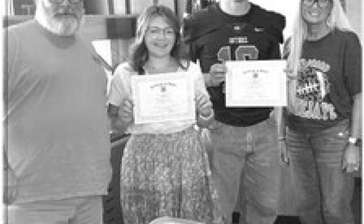 Left to right: Troy Jenkins, Students of the Month Kyndal Carey and Josh Varnel, and Annie Chadd. Submitted