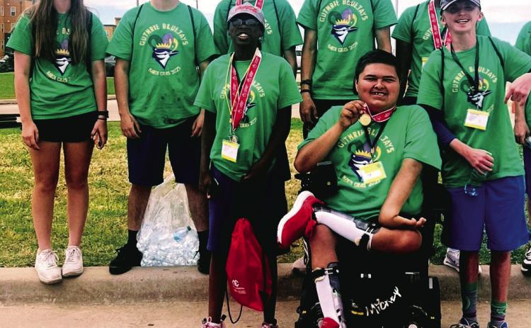 Members of the Guthrie High School team that competed in the Special Olympics Summer Games. Front row: Elijah Robles. Middle row, from left: Sanaa Jones; Hunter Swain. Back row, from left: Kennedi Wheeler (unified partner); Julian Duncan; Jordon King; Lance Evans (unified partner); Tre Bennett. Photo submitted by Laura Benham.