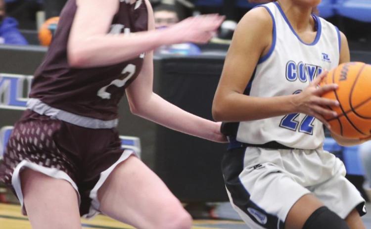 Aubrey Taylor drives to the bucket.
