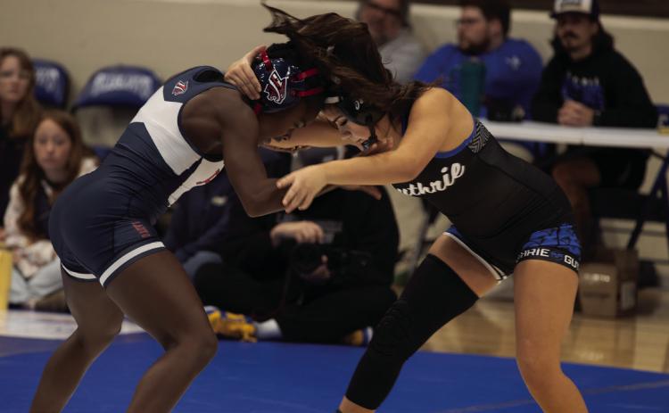 Lady Jay Gabby Kirk faces her opponent at the Holly Howard Tournament.