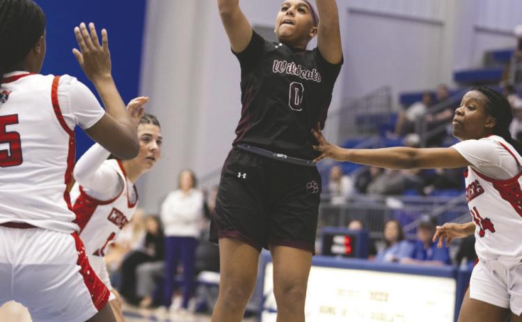 Cashion’s Lily Stuemky (20) attempts a shot againstChristian Heritage Academyduring the Class 2A girls state championship game Saturday at Bridge Creek High School in Blanchard, Okla. Christian Heritage defeated Cashion 60-36