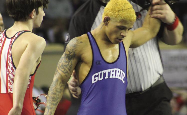 Guthrie's Kaedin Herendeen wins the 120-pound semifinal match over Bishop Kelley's Connor Chancellor at the 5A State Championships. Photo by George McCormick.
