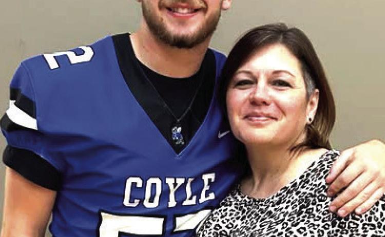 Xavier Noble with his Mom.