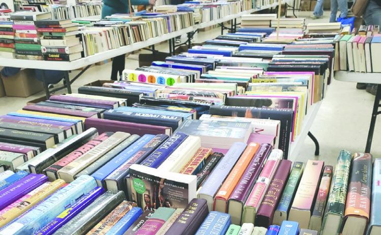 Donated books line tables ahead of the Friends of the Guthrie Library book sale set for Feb. 7. Submitted photos