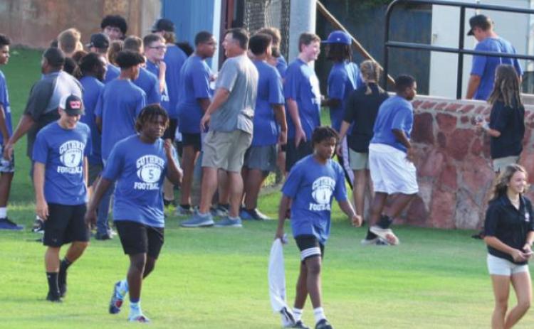 Varsity fb enters the field at Meet the Jays