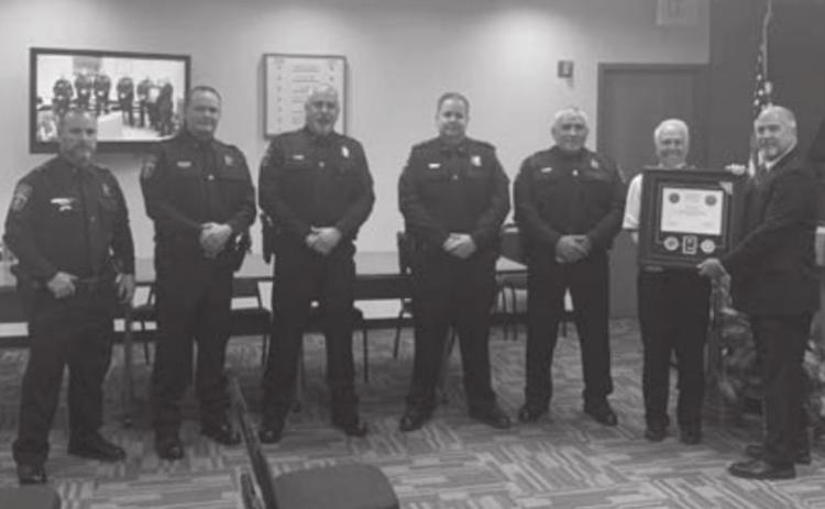 Guthrie Police Department receiving award at City Council meeting.