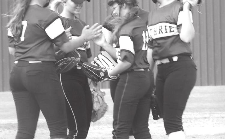 GHS slow pitch huddle.