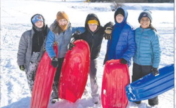Boys and their sleds: Knox Abbott, Corbin Phillios, Henry Cotton, Asher Abbott, and Braysen Claud spent their snow day racing down the hills at Guthrie Upper Elementary School. Photo submitted by Sarah Phillips