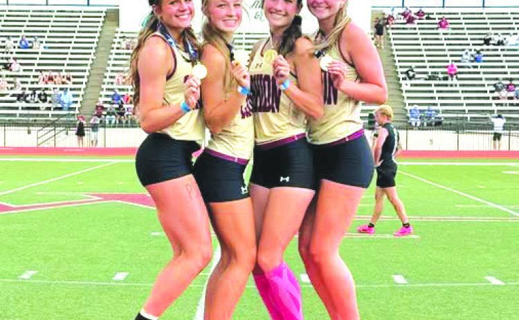 Members of the Cashion High School girls 4x100-meter relay team Kastner, Eubanks, Nabavi and Hobgood celebrate after winning the Class 2A state championship. Photo courtesy of Cashion Public Schools